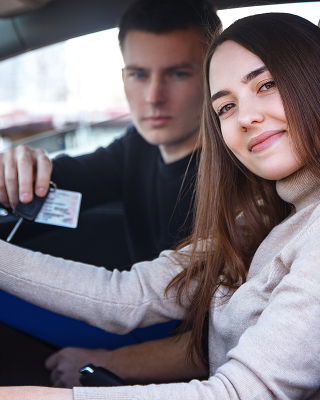 happy girl in a new car receives a drivers license 2025 01 08 23 32 14 utc 1